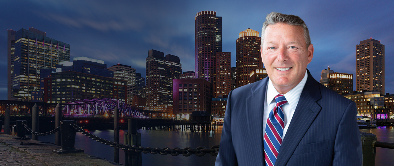 Patrick J. Murphy with Boston skyline in the background